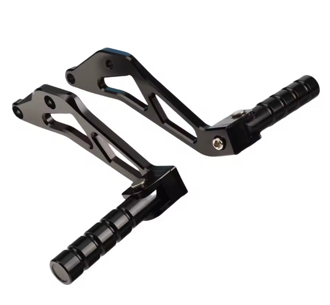 Surron rear passenger pegs