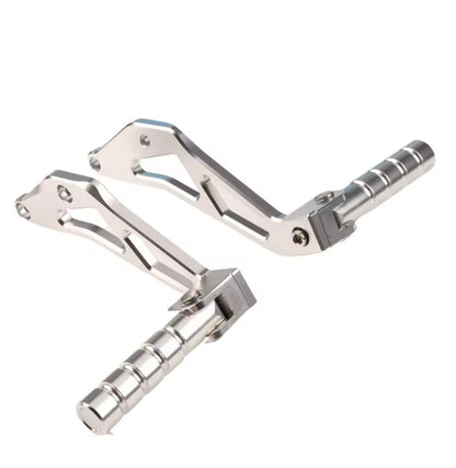 Surron rear passenger pegs